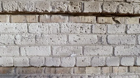 Pan shot of white brick wall for transition background, slow motion Stock Footage 125017143