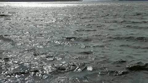 Pan from Silvery Lake to Fluffy Clouds Stock Footage 20503613