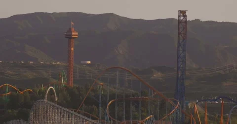 Pan of Six Flags Magic Mountain in Santa Clarita, Ca. from south with audio Stock-Footage 201026057