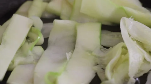A pan of sliced ​​zucchini Видео 38919050
