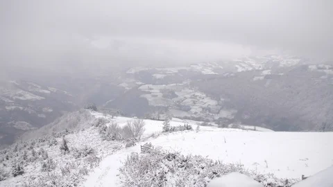 Pan of Snow Covered Valley Overlooking the Small Town of Bajina Basta, Serbia Stock Footage 90183085