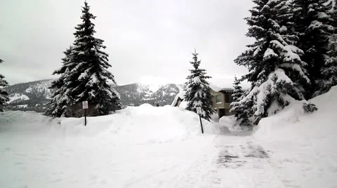 PAN OF SNOWVBOUND CONDOS Video stock 1012729