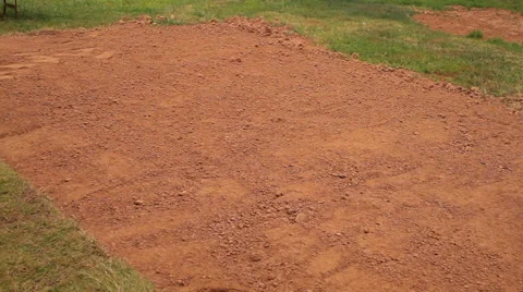 Pan of sod being rolled out onto fresh dirt. Stock-Footage 64539349