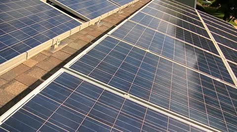 Pan of Solar Panels on roof Stock Footage
