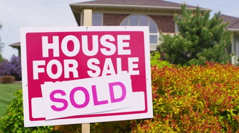 Pan up of sold house Stock-Footage 62283973
