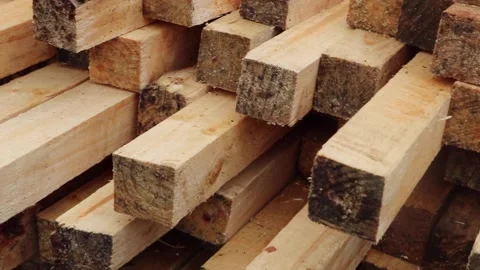A pan of a stack of rectangular wooden blocks Stock Footage 154976202