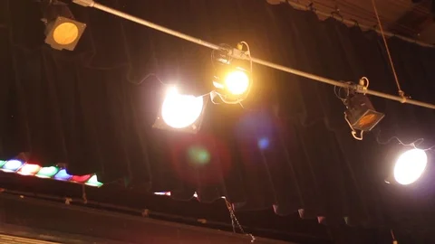 Pan of stage lights in an auditorium Stock Footage 92966071