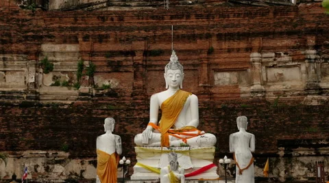 Pan Up of Statue of Buddha to Temple Top - Thailand Stock Footage 53239267