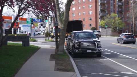 PAN STREET TO SCHOOLBUS Stock Footage 194383808
