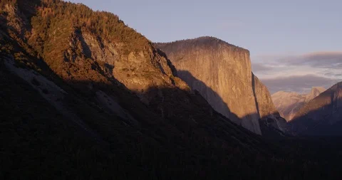 Pan of Sun setting over, El Capitan. Yosemite National Park, Califorina, Shot 库存影片 103450054