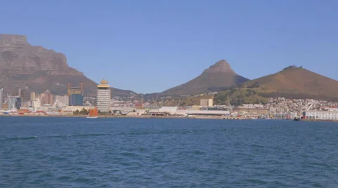 A pan of table mountain as seen from a boat heading to Robben island Video stock 36490397