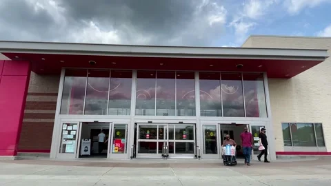 Pan of Target retail store and people wearing face masks Stock Footage 156426877