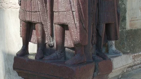 Pan up Tetrach statues, St Marks Square Venice, Italy Stock Footage 74342376