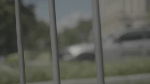 Pan through metal gates slow motion Georgia State Capital w/ police Stock-Footage 133544264