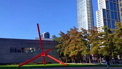 Pan & tilt up from outside Dallas Museum of Art to luxury high-rise apartments Stock Footage