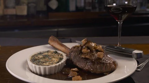 Pan in of tomahawk steak  Stock Footage 112576014