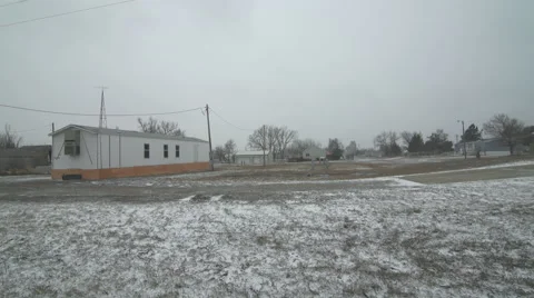 Pan to trailer during a cold snap on an Indian Reservation Stock-Footage 40321116