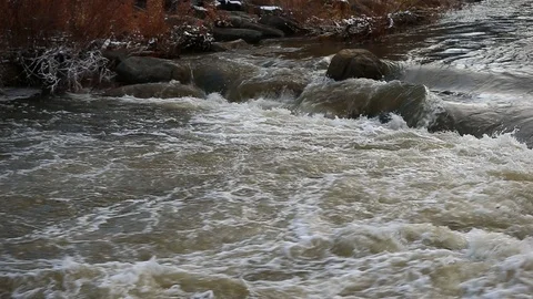 Pan of Truckee River with High Flood Waters - Shallow Depth of Field Stock Footage 103122682