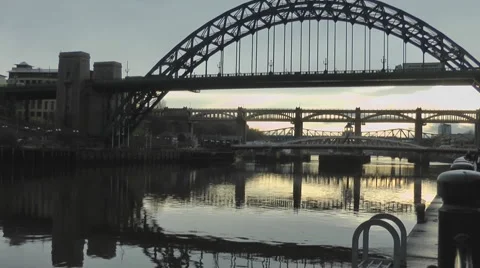 Pan up to Tyne Bridge from mooring ring on quayside Stock Footage 1102759