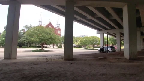 Pan under a bridge and traffic Stock Footage 158188218