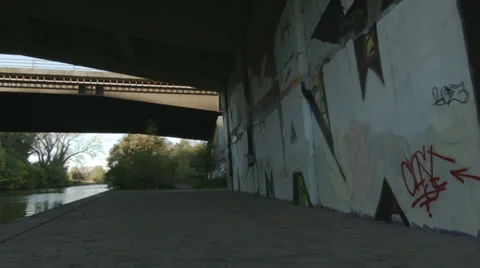 Pan of underside of motorway bridge Stock Footage 32927554