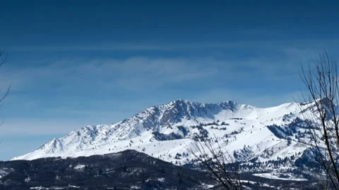 Pan Up Utah Snow-Capped Mountains To Clear Blue Vivid Sky 스톡 동영상 210541271