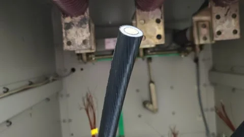 Pan up video of a cut underground electrical power cable cross section show. Stock-Footage 338355432