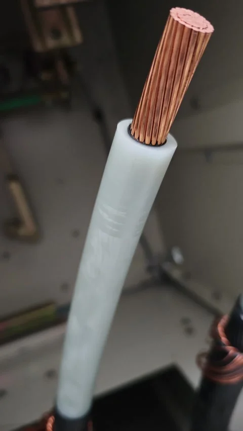 Pan up video of a stripped underground electrical power cable showing. Stock-Footage 338355421