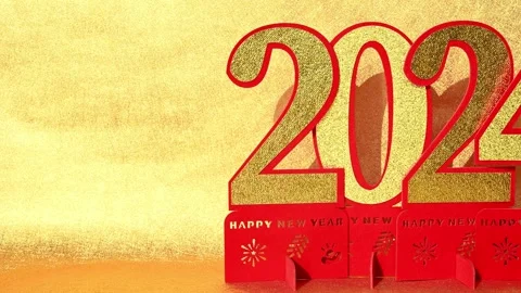 Pan view 2024 paper cut on golden background no logo no trademark Stock Footage 258000820