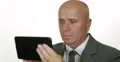 Pan View Businessman Use Tablet Connecting Stock Exchange Electronic Data Base 4k or 4k+ Resolution