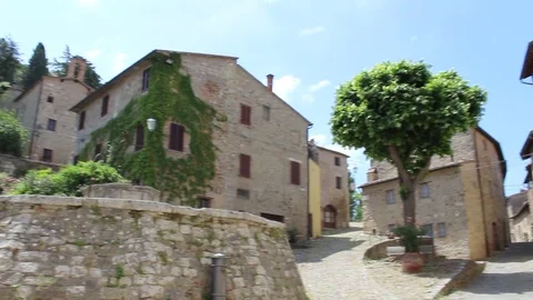 Pan view of the Cisterna square with the big well in the medieval village Stock Footage 80151507