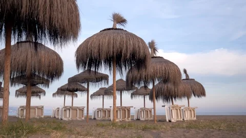 Pan  view of an empty sandy beach. Nice cloudy dramatic sky. Stock Footage 118852805