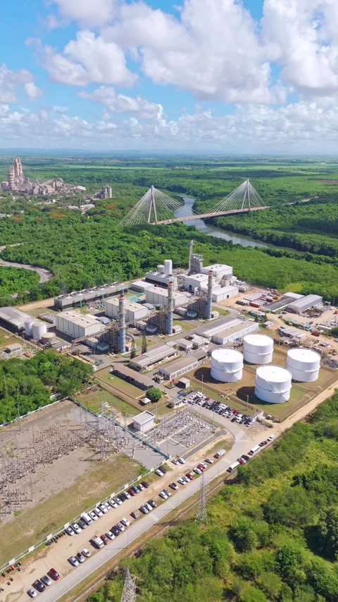 Pan view of the Energa 4 power generation facility, fuel storage tanks Stock Footage 319531536