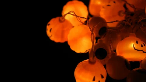 Pan view flaring jack-o-lantern lightings and eyeball lightings Stock Footage 163871639