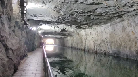 Pan view of the interior of Taiwan Kinmen island historic Zhaishan Tunnel Stock Footage 321623771