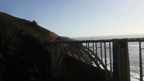 Pan view of the land side of Bixby Creek Bridge, in Big sur, California, Un.. Stock Footage 72446782