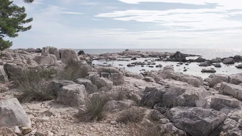 Pan view of Lokrum Island main rocky beach, Dubrovnik, Croatia Video stock 294912349