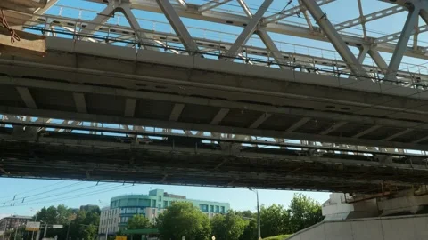Pan view of lower part of bridge from ground. Construction of new railway bridge Stock Footage 135738566