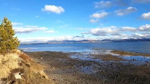 Pan view on mountain beneath lake yellowstone, in Yellowstone national park.. Stock Footage 71785316