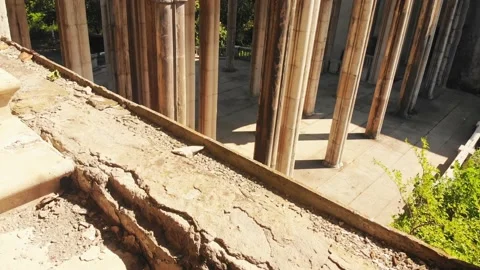 Pan view old beautiful columns old Soviet sanatorium Medea, architecture whic Stock-Footage 157890768