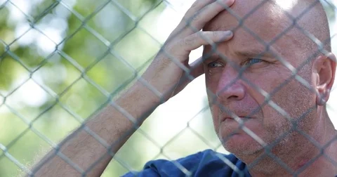 Pan View Sad Men Beside Metal Fence Border Suffering Depressed Stressed 스톡 동영상 83665505