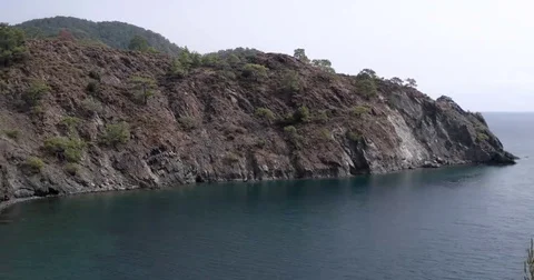 Pan View of a Small Wild Bay With a Beach Stock Footage 69182885