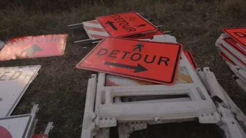 Pan walk in left to right of multiple white and black and black and orange Detou Stock Footage 263904310