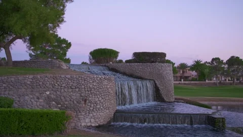Pan waterfall on golf course Stock Footage 153781611