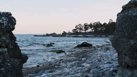 Pan To Waves Between Rauks Folhammar Gotland Sweden Stock Footage 331374064