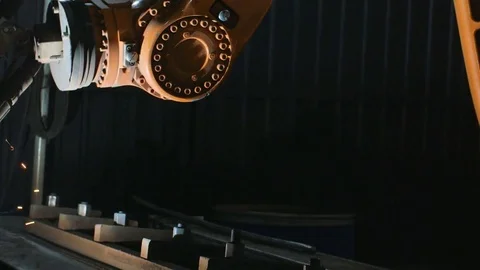 Pan of welding robot arm melt metal process at workshop. High Precision Modern Stock Footage 84805381