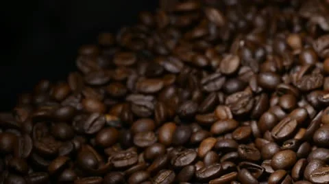 Pan on white candle on coffee beans Stock Footage 22105537