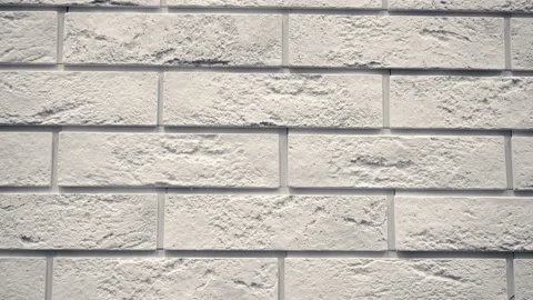 Pan white decorative brick your home. Brickwork backdrop. Unique drawing block Stock Footage 99147972