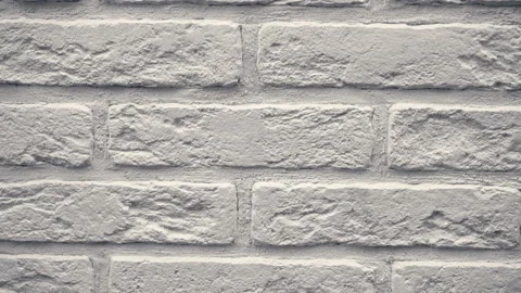 Pan white decorative brick your home. Brickwork backdrop. Unique drawing block Stock Footage 99235984