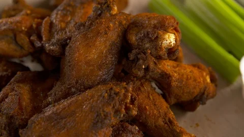 Pan up of wings and celery  Stock Footage 112576256